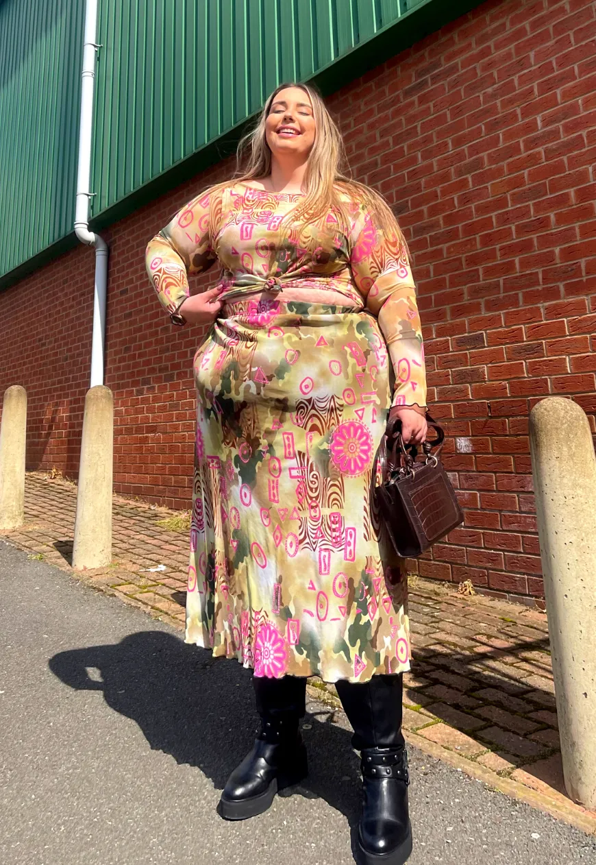 PINK SWIRL MESH SLEEVED TOP